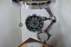 VW themed lamp. 12V automotive style LED's. Interior of speedometer is lit. Sapele and maple base, all vintage parts. This lamp took first prize at the 2019 Orange County Fair in the upcycled category.