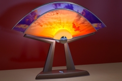 Sun-lamp, concept shown as if light projectors on 2 screens displayed live video image feeds of sun and moon.