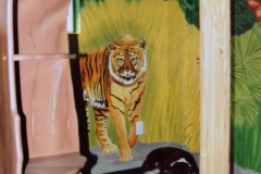 Detail of mural in jungle room.