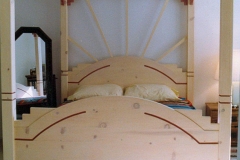 Art Deco/southwest themed bed for my wife, made before we were married. Solid pine.