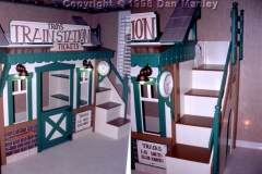 Train station theme clubhouse bed, for same customer as gas station. Working lights and clock.