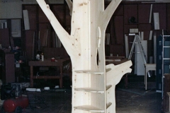 Tree-shaped ladder and toy storage piece, went on side of log style bed. Prior to finishing.
