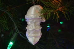 Smaller version of Santa Tiki, done as tree ornament. Gave as gifts.