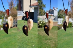 Dual-leaf pendant. Various woods.