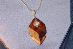 Silver/wood necklace, birthday gift to my wife. Elm Burl, Walnut, White  Oak, Sapele, Tiger Maple. Silver 3D print from my CAD design.