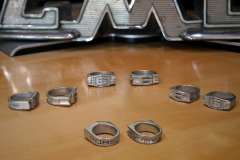 Flat-6 ring prototype 3D prints in plastic, painted silver for idea of appearance printed in silver. Version with 6 in shield would work for Corvair lettering also.