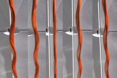 Serpentine theme walking stick, mahogany.