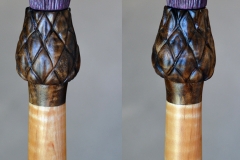 Top of walking stick. Blossom sealed with UV resistant polyurethane, rest of stick finished with 3 coats of teak oil.